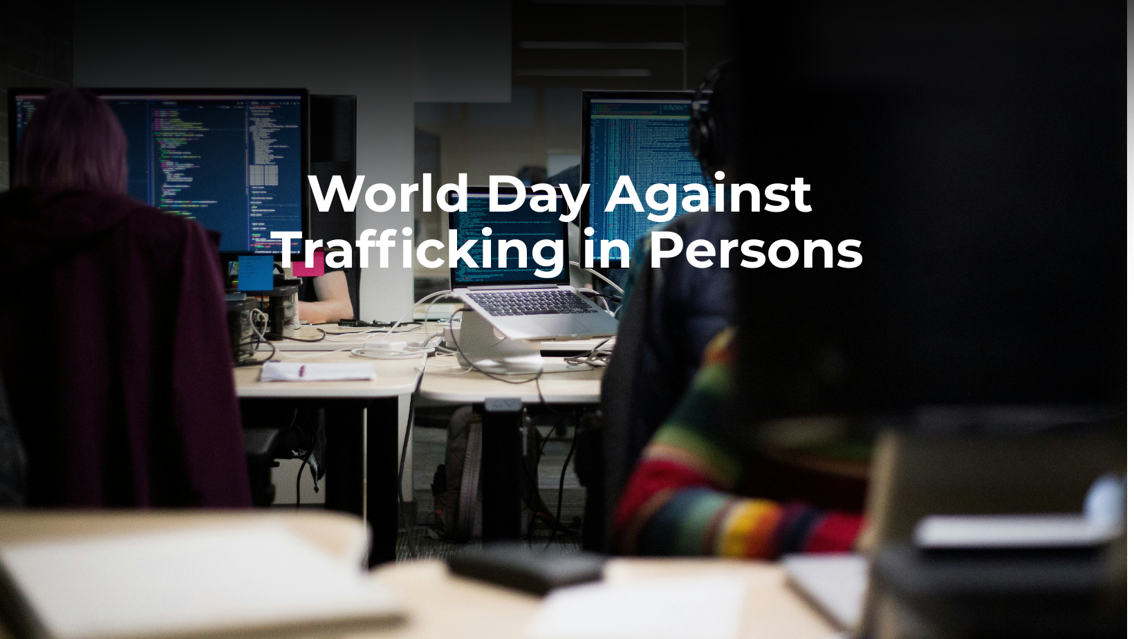 call center image with text overlay saying World Day Against Trafficking in Persons